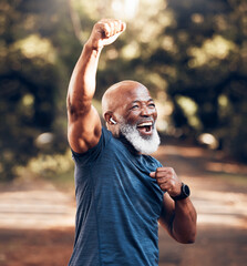 Park, success and running, winning black man excited and celebration at fitness run in nature with earphones. Music, workout and mature runner with smile and happy to celebrate exercise achievement.