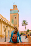WOman travel in Marrakech,  Koutoubia mosque,  Morocco