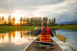 © Cavan Images - Canoeing on Burnaby Lake, British Columbia.