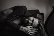© Cavan Images - Young handsome man with long dark hair, fashion portrait.