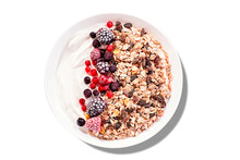 Isolated Muesli Bowl Or Granola Bowl With Yogurt And  Red Berries. Healthy Breakfast, Top View. Dish Suitable For Diet, Healthy Lifestyle