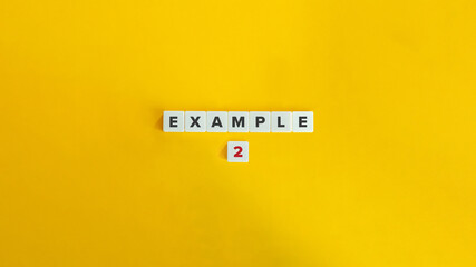 example 2 (two) banner and concept. text on block letter tiles on yellow background.
