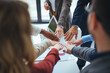 © Dragana Gordic - Close up view of young business people putting their hands together. Stack of hands. Unity and teamwork concept. Close-up of co-workers stacking their hands together. Diverse business people