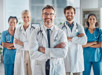 Wall Mural - Leadership, teamwork and portrait doctors and nurses in hospital with support and success in healthcare. Health, help and medicine, confident senior doctor and happy medical employees smile together.