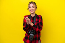 Uruguayan Photographer Woman Isolated On Yellow Background Applauding After Presentation In A Conference