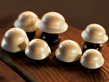 Champignons Mushrooms On A Wooden Table. Edible Mushrooms Spilled On The Table. Generative AI.