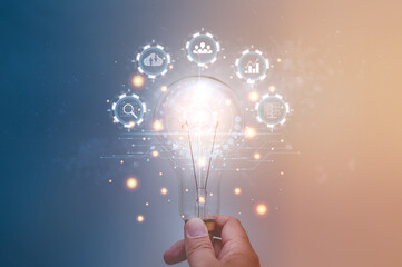 Poster - Businessman holding a light bulb represents creativity, knowledge, strategic planning. Analyze corporate data, companies market competitors Finance and Business Growth business idea concept