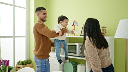 Poster - Couple and son smiling confident playing at home