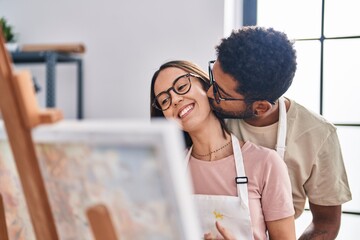 Sticker - Man and woman couple smiling confident drawing at art studio