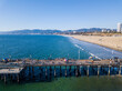 Aerial photos of the santa monica Pier, The Strand bike path, and beach in Santa monica California. Photos taken on a public beach with a drone.
