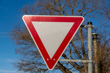 Sign On A Road German Right Of Way Traffic Sign Triangle With Red Border