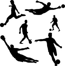 Silhouette Of Soccer Player Kicking And Catching Ball