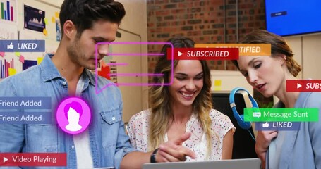 Poster - Animation of social media and notification icons over caucasian coworkers discussing over laptop