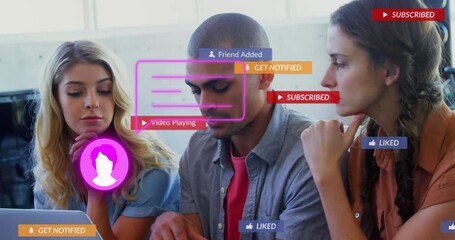 Poster - Animation of social media and notification icons over diverse coworkers discussing reports on laptop