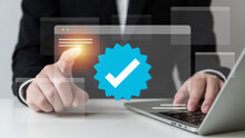 Businessman Using Laptop With Verification Account Blue Tick Checkmark Concept, Verification Account On Social Media Platform, Subscription Status, Eliminate Bots, Spam.