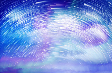 Wall Mural - Star trails in a night sky, Meteor shower in the night sky, Star long exposure, Abstract star trails in sky.