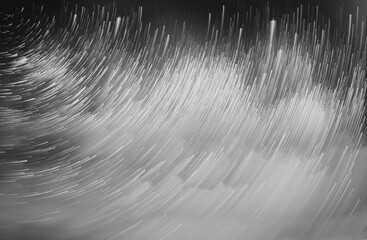 Wall Mural - Star trails in a night sky, Meteor shower in the night sky, Star long exposure, Abstract star trails in sky.