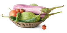 Various Organic Vegetables On A Basket Or Container, Eggplants, Tomatoes, Green Chilies And Chayote Isolated
