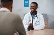 © Anela R/peopleimages.com - Black man doctor with patient in consultation office for healthcare advice, services and professional support. Medical worker talking, consulting and discussion with client or person in health clinic