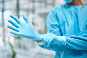 Aufkleber - Medical gloves, medical gear and doctor hand in a wellness and health clinic ready for surgery. Safety, research and laboratory hygiene of a healthcare and nurse employee with blurred background