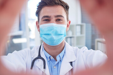 Poster - Covid, portrait and selfie by man doctor at hospital for medical, innovation and research. Corona, face and health expert with mask for compliance while posing for a photo, post of profile picture