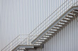 fire exit stair of large factory building. galvanise metal stair step of the big cargo.