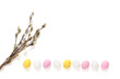 willow branches  on white background. candy Easter eggs. Element for the theme of religion, Palm Sunday and Easter.	