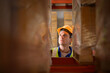 © Wosunan - Head of worker portrait  in an auto parts warehouse, Examine auto parts that are ready to be shipped to the automobile assembly factory.