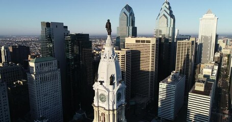 Sticker - Philadelphia City Hall Tower and bronze statue of William Penn. Cityscape and Beautiful Sunset Light in Background I