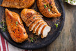 © fahrwasser - Grilled or roasted chicken breast on a serving plate
