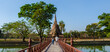 A couple of men and women visit Wat Sa Sit, Sukhothai old city, Thailand. Ancient city and culture of south Asia Thailand, Sukothai historical park