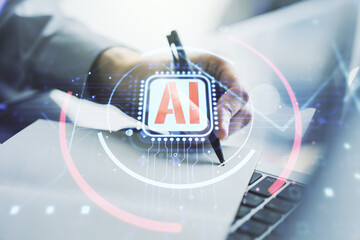 Poster - Double exposure of creative artificial Intelligence abbreviation with hand writing in notepad on background with laptop. Future technology and AI concept