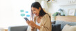 © Monster Ztudio - Young asian woman using mobile smartphone. Chatting conversation in chat box icons pop up bubble speech. Social media direct message