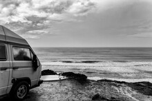 Surfer Campervan With A View To Perfect Breaking Waves.