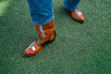 A Texan Displays His Pride Of The Lone Star State With His Custom Cowboy Boots.