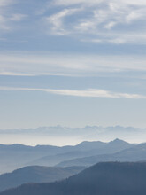Elevated View Across Mountain Ranges And Clouds, Winter