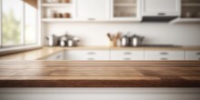 Empty Wooden Table And Blurred White Kitchen White Wall Background. Wood Table Top On Blur Kitchen Counter