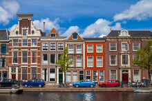 Colorful Houses And Cars Along The Canal Embankment In Leiden, Netherlands