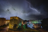 Fototapeta Niebo - Thunder in city