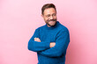 © luismolinero - Middle age caucasian man isolated on pink background looking to the side and smiling