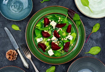 Wall Mural - Fresh salad with beets, cheese and greens.