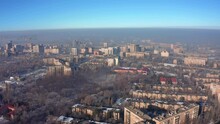 Flying Back On A Drone View Of Houses In The Suburbs Of Bishkek Against The Backdrop Of A City Covered In Smog And Smoke Pollution Of The Air And The Environment By Exhaust Gases