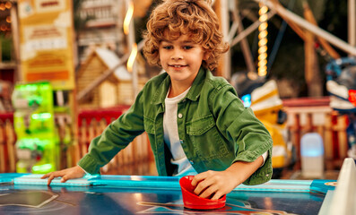 Kids having fun on a carnival Carousel