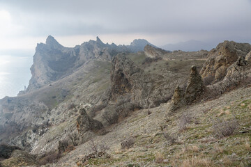 Wall Mural - Bizarre rocks in Dead city. Khoba-Tele Ridge of Karadag Reserve in spring. Crimea