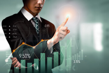 Businessman analyst working with digital finance business data graph showing technology of investment strategy for perceptive financial business decision. Digital economic analysis technology concept.