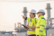 © reewungjunerr - Group Asian man petrochemical engineer working at oil and gas refinery plant industry factory,The people worker man engineer work control at power plant energy industry manufacturing