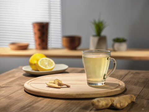 Fototapete - Ginger tea with lemon on the table