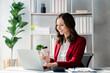 © kamiphotos - Beautiful woman is a businesswoman who leads a new generation of startups, a woman who runs and manages a business plan to build confidence and stability in business, woman-led business concept.