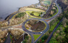 Aerial View Of Roundabout Over Railway Track At Port Glasgow