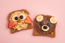 Funny Animal Faces Toasts With Spreads, Banana, Strawberry And Blueberry For Kids Lunch